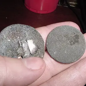 MYSTERY COIN ON LEFT - SILVER HALF ON RIGHT