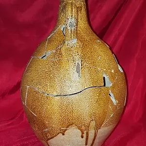 Reconstructed 17th century Bellarmine (aka Bartmann) jug. Shards dug from the "Swamp Pit"