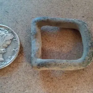 1944 Mercury Dime and a tack buckle