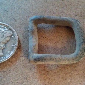 1944 Mercury Dime and a tack buckle