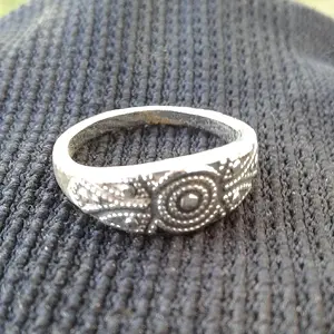 First ring I ever found and it's an Avon one for a tiny girl's finger.