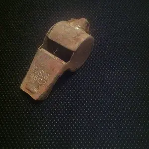 An old whistle. The ball is still inside, just a bundle of fibers now.