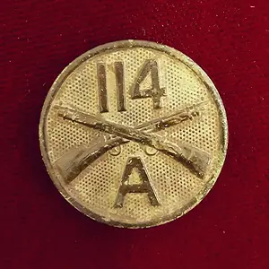 WWI era collar disk-114th Infantry Regiment, Company A.  Found at the same home site where I found the dog tag.