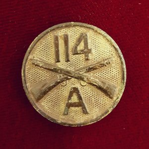 WWI era collar disk-114th Infantry Regiment, Company A.  Found at the same home site where I found the dog tag.
