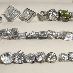 JUST SOME OF THE STUD EARINGS IVE GOTTEN OVER THE YEARS - IVE GOTTEN MANY AT CLEANED OUT SPOTS - I WILL GET HIT THAT IS SMALL BUT HIGH PITCH ON THE CZ