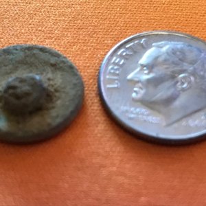 Button #2. Small. Shank side. Found with the XP DEUS on the other side of the James River. Could be colonial. Will post in forums for for ID. Smooth s