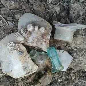 c/w era pottery shards,bottle pieces,.69,.58 & small cal.projectiles,lead button.