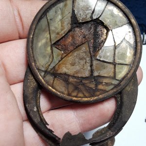 Compact Mirror - possibly mother of pearl glass
Says Patented 3-5-24
Found at a house built in 1930