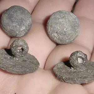 MUSKET BALLS AND COLONIAL FLATBUTTONS