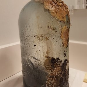 BOTTLE PARTIALLY CLEANED