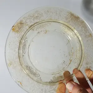 Yellow dish.  Found in an old bottle dump