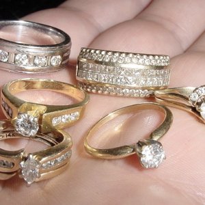 JUST SOME OF THE DIAMOND RINGS FOUND FROM HUNTS IN FLA. WATERS FROM SHORT TRIPS OVER THE YEARS