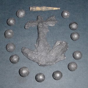 FOUND IN WATERS OFF OF A REVWAR/1812 WAR/ CW FORT 
ANCHOR I BELIEVE IS SOLDIER ART - IT IS A SAND CAST PROBABLY MADE FROM MELTED MUSKETBALLS