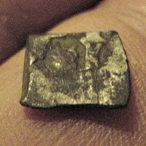 THIS IS WHAT IS KNOWN AS A "BIT" - IT WAS CUT FROM A COB AND YOU COULD BUY A PINT OF GROG WITH IT