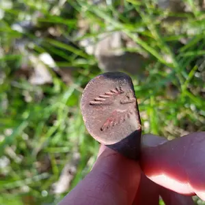 "Victory Red" Elizabeth Arden lipstick lid from the 1940's. Found on May 17th, 2020.