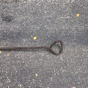Found near the railroad... furnace stoker? Handle end.