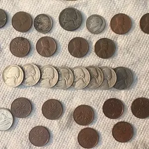 Change hunting 9-13. 2 silver rosies, 43-d war nickle, 4 wheats, and misc other stuff.