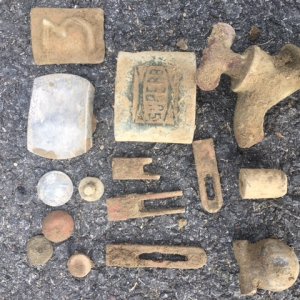 My finds at the schoolhouse 11-14. The only coin was a 1902 barber dime and I'm very curious about the little lead weight. I also hunted a nearby home
