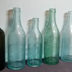 Pictorial Tooled Crown Beer Bottles