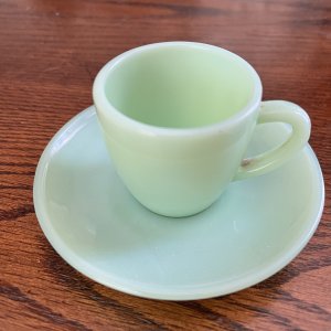Tiny cup saucer