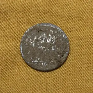 Seated Silver Before Cleaning - CW picket post find, 2007

Check out the story:

http://forum.treasurenet.com/index.php/topic,113377.0.html