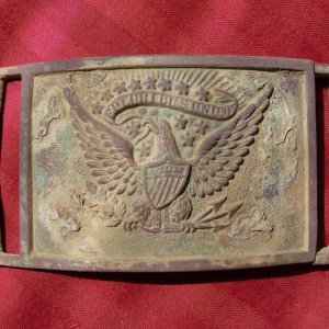 Civil War Sword Belt Plate - Read all about it here:

http://forum.treasurenet.com/index.php/topic,153203.0.html#top