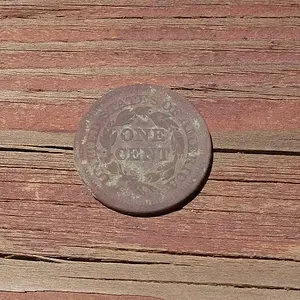 1851 Large Cent, Reverse - Here's the back of the LC cleaned up.

And here's the link to the story:

http://forum.treasurenet.com/index.php/topic,1616