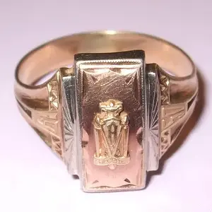 1950 10k Class Ring - I found this 10K gold class ring in the woods at Fort McClellan. It says St. Angelas on it and has the initials on the inside. I