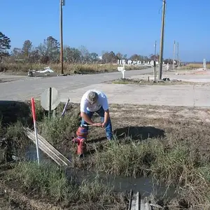 Katrina - One moment of a 4 week stint in Bay St. Louis, Mississippi after Hurricane Katrina hit. We were working to get the Hancock County Utility Di