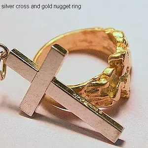 First silver cross & a nugget ring