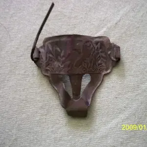 i think this is a decorative suspender clip