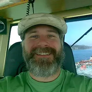 me - Last but not least. This is what I look like after about 60 days on the boat. I absolutely hate shaving. I cut it all off for the wife the day be
