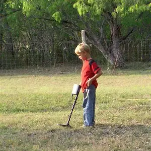 my little guy - barefoot and holding up his britches with the other hand..can you say country hick?