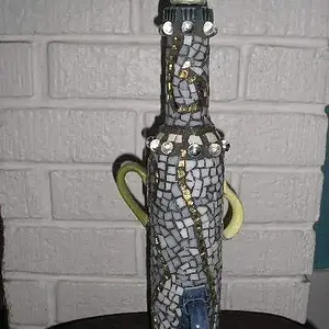 Mosaic work - I upcycle my shard finds and create mosaic pieces for the home and garden.

www.soulshards.etsy.com
