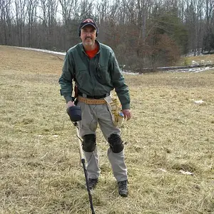 Me - Digging a little dirt on an old home-site in Morgan County, KY.  Feb. 2010.