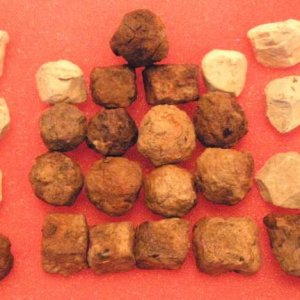 U.S. Artillery Relics -          These are 3 types of artillery artifacts that we find in Smith County, TN. The round iron balls are canister shot. Th