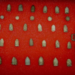 Hartsville Bullets and Lock -        These are bullets from the battle lines from Hartsville and a lock found found at a picket post. The key cover on