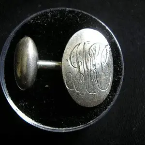 Silver Cufflink marked "J.M.B." - Found Spring 2010