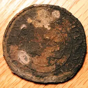 'Continental Curency' ? - Pulling this from the mud nearly dropped me to the ground! Thanks Mike (Woodlawndetectorsales) for talking me down.
 A photo