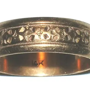 Fancy Gold Ring - This Fancy gold wedding band is 14k.