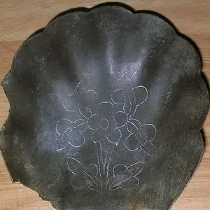 Old Salt Dish - I dug this brass salt dish at an old house site. I rubbed powder in it so you can see the design of flowers.