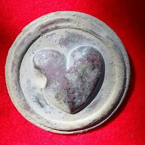 Brass Heart Rosette -         Dug this one near the Hartsville Battle area on 10-25-11 while hunting with Dman. Ironically, I dug a plain brass rectan