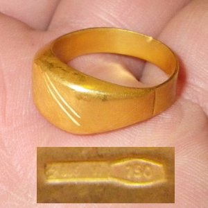 750 = 18K - RING FOUND IN FLORIDA 2012 TRIP - IN WATER
(CZ21)