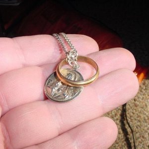 18K RING ON A SILVER CHAIN WITH RELIG.MED. - THIS WAS A NEAT FIND