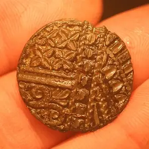 ornate pewter button,
this is a rare find.