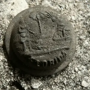 Post War FL military coat button found by hunting buddy.