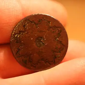 looks copper, reads Tombac ??