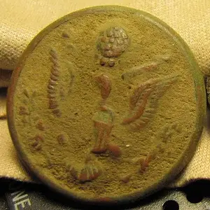 WWII Eagle Button before cleaning. 10/2012