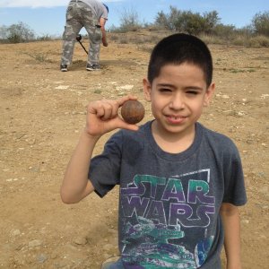 Mikey holding a cannon ball. February 2, 2013