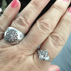One on right. Had to give to my mom...she birthed me! That makes two she's sweet talked me out of. The other was a massive 14kt gold band found at Lak